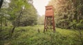 Wooden hunting tower in a forest