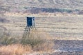 Wooden hunting watchtower in the winter