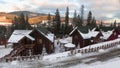 The wooden hut covered with fresh snow in the woods in the winter landscape in the Carpathian mountains , Bukovel , Ukraine Royalty Free Stock Photo