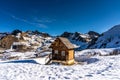 Wooden hut in mountains in ski resort isola 2000, france Royalty Free Stock Photo