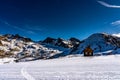 Wooden hut in mountains in ski resort isola 2000, france Royalty Free Stock Photo