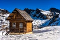 Wooden hut in mountains in ski resort isola 2000, france Royalty Free Stock Photo