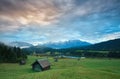 Wooden hut o meadow by Geroldsee lake at sunrise