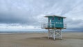 Wooden hut white blue colors on wood stilts of the lifeguards on sandy beach of deauville city in france Royalty Free Stock Photo