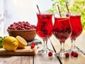 On wooden is ice cold beverage glass with berries cocktail . Royalty Free Stock Photo