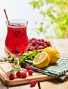 On wooden is ice cold beverage glass with berries cocktail . Royalty Free Stock Photo