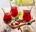 On wooden is ice cold beverage glass with berries cocktail . Royalty Free Stock Photo