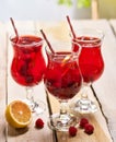 On wooden is ice cold beverage glass with berries cocktail . Royalty Free Stock Photo