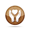 Wooden icon of flat heart in hands