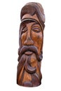 wooden idol statue of koryak on a white background. Selective focus