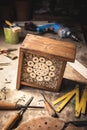 Making wooden insect hotel in workshop Royalty Free Stock Photo