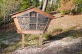 Wooden insect house decorative bug hotel ladybird bee home house garden for butterfly hibernation for ecological gardening Royalty Free Stock Photo