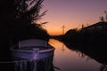 Sunset albufera valencia rice field, almost at night with electric pole, purple Royalty Free Stock Photo