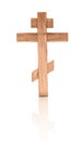 Wooden isolated cross on a white background