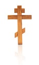 Wooden isolated cross on a white background