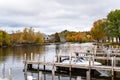 Wooden Jetties on river on a cloudy autumn day