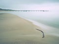 Wooden jetty and on blue lake sunset and cloudy sky Royalty Free Stock Photo