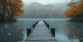 wooden jetty bridge at foggy autumn lake. Wallpaper photography Royalty Free Stock Photo