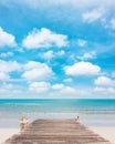 Wooden jetty at clean beach Royalty Free Stock Photo