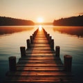 Wooden jetty protrudes into the lake during sunset Royalty Free Stock Photo