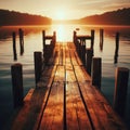 Wooden jetty protrudes into the lake during sunset Royalty Free Stock Photo