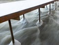 Wooden jetty with ice Royalty Free Stock Photo