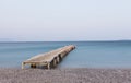 Wooden jetty at Ipsos beach Royalty Free Stock Photo