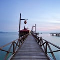 wooden jetty on mabul island looking across the ocean to sipadan Royalty Free Stock Photo