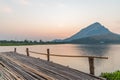 Wooden jetty on a mountain lake on morning Royalty Free Stock Photo