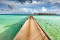 Wooden jetty on the ocean on Maldives Islands