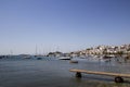 Wooden jetty in the old harbour of Skiathos, Skiathos Town, Greece, August 18, 2017 Royalty Free Stock Photo