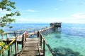 Wooden jetty and shack on sea Royalty Free Stock Photo