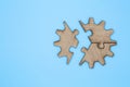 Wooden Jigsaw Puzzle  parts on blue background Royalty Free Stock Photo