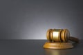 Wooden judge gavel against grey background , close up Royalty Free Stock Photo