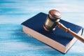 Wooden judge gavel and law books Royalty Free Stock Photo