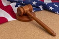 Wooden judge`s gavel on the background of the American flag. Concept: claim and compensation for damages, court session, announcem Royalty Free Stock Photo