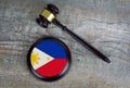 Wooden judgement or auction mallet with of Philippines flag. Conceptual image Royalty Free Stock Photo