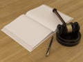 Wooden Judges Gavel And open book on the wooden background Royalty Free Stock Photo