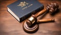 Wooden judges gavel and open law book in a Royalty Free Stock Photo