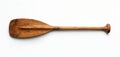 Wooden kayak paddle, a single object with a broad blade and rounded handle. This craft tool has a polished smooth finish and is Royalty Free Stock Photo