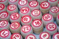 Wooden kegs, cards and chips for a game in a lotto