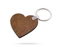 Wooden key ring isolated on white background. Key chain for your design. Clipping paths object. Heart shape