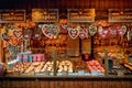 Wooden kiosk with traditional Christmas sweets in Vienna, Austria.