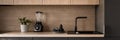 Wooden kitchen countertop with black sink, panorama