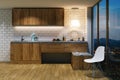 Wooden kitchen furniture in modern interior. Evening view from b