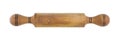 wooden kitchen rolling pin on a red wooden