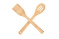 Wooden kitchen spoon and spatula on a white background top view