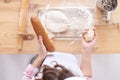 Wooden kitchen table. White flour. Preparation of test. Ready made pastry or bakery bread at home factory. Rolling bun Royalty Free Stock Photo