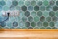 wooden kitchen tabletop and vintage green tile Royalty Free Stock Photo