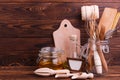 Wooden kitchen tools on a brown background Royalty Free Stock Photo